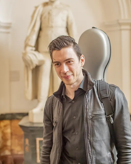 a beautiful picture of Nicola Siagri with his trusty cello case